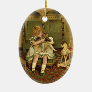 Lovely Child Holding a Kitten Ornament