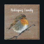 Lovely cute robin bird on wood family name magnet<br><div class="desc">Lovely cute robin bird on wood family name magnet.
Add your own name to personalise.</div>