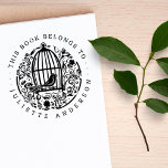 Lovely Vintage Floral Bird Cage Custom Name Book Rubber Stamp<br><div class="desc">This lovely circular library stamp features a beautiful vintage illustration of a bird outside of the cage surrounded by flowers. On the top, it reads, in the classic typography: ´´this book belongs to´´ and on the bottom, there is a custom name. The top text is divided from the bottom one...</div>