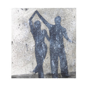 Lovers dancing in rain notepad