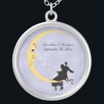 Loving Couple Sitting on Crescent Moon Stars Silver Plated Necklace<br><div class="desc">This round pendant style necklace is light blue with a loving couple sitting on a yellow crescent moon with a scattering of white stars behind them.  customise your names and date with the template.</div>