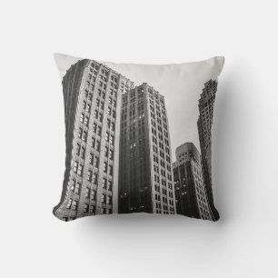 LOW ANGLE GRAYSCALE PHOTOGRAPHY OF HIGH-RISE BUILD CUSHION