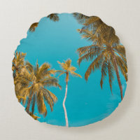 Low-angle photo of coconut trees