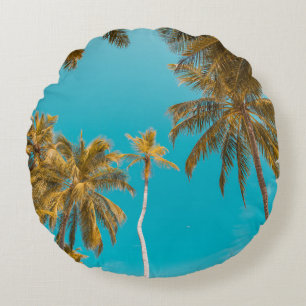 Low-angle photo of coconut trees round cushion