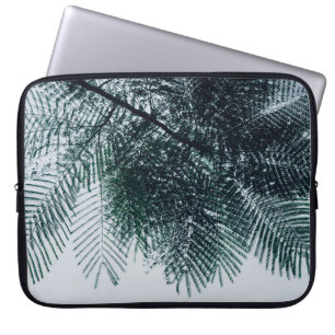 Low-angle photo of green tree laptop sleeve