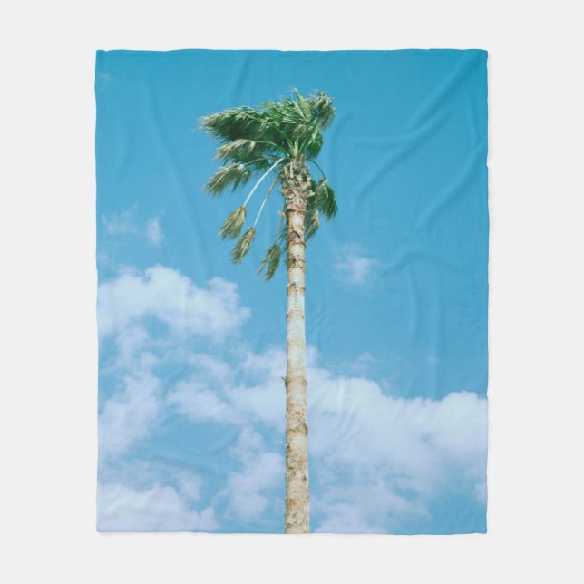 Low-angle photo of palm trees under blue sky fleece blanket (Front)