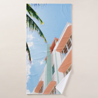 Low angle photo of white and orange concrete build bath towel