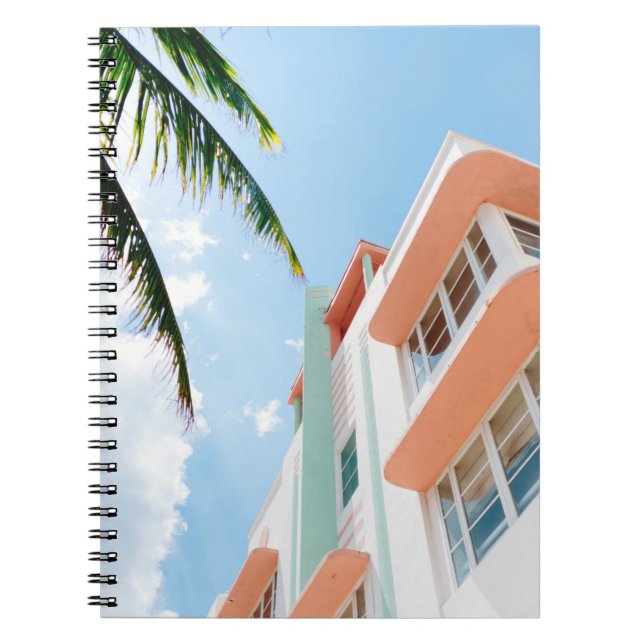 LOW ANGLE PHOTO OF WHITE AND ORANGE CONCRETE BUILD NOTEBOOK (Front)