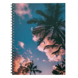 Low-angle photograph of palm trees notebook