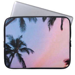 Low-angle photography coconut trees during golden laptop sleeve