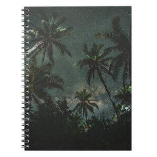 LOW ANGLE PHOTOGRAPHY OF A COCONUT TREES WITH STAR NOTEBOOK