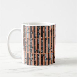 Low-angle photography of building coffee mug