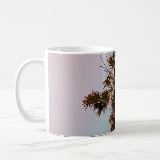 Low-angle photography of palm plant coffee mug (Left)