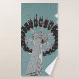 Low-angle photography of people riding a drop-down bath towel