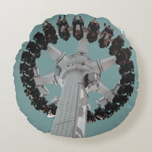 Low-angle photography of people riding a drop-down round cushion