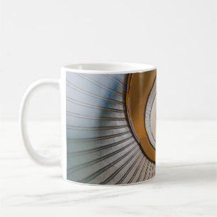 Low angle photography of spiral ladder coffee mug