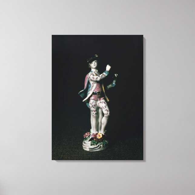 Lowestoft figure of a boy playing a triangle canvas print (Front)