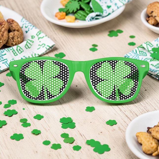 Lucky Clover Party Shades (Lucky four-leaf-clover shamrock party shades in green, on a table with party snacks and confetti.)