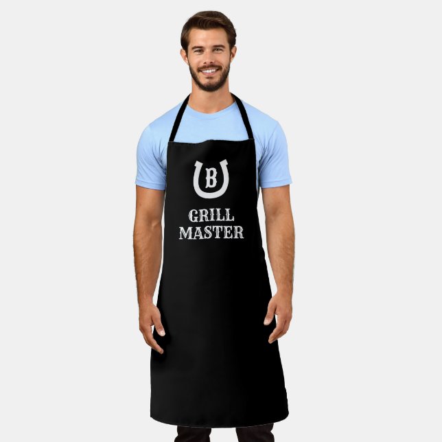 Lucky horseshoe logo monogram black BBQ apron (Worn)