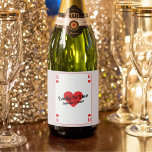Lucky In Love Playing Card Couples Shower Favour<br><div class="desc">Elevate your couples shower with our custom 'Lucky In Love' bottle labels! Embrace the whimsy of a playing card-inspired design, adorned with iconic heart King and Queen symbols, all rendered in bold red, white, and black hues. Make a statement with personalised text, prominently featuring the endearing phrase 'Lucky In Love'...</div>