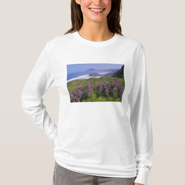 Lupine flowers and rugged coastline along T-Shirt (Front)