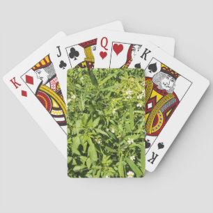 Lush green floral field playing cards