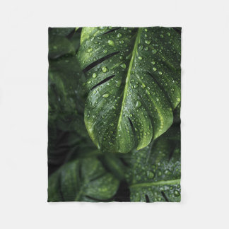 Lush Monstera Leaves with Morning Dew Drops Fleece Blanket