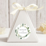 Lush White Flowers and Greenery Wedding Classic Round Sticker<br><div class="desc">Seal your wedding invitation envelopes or favours with our elegant floral wedding stickers featuring your names encircled by painted white gardenia flowers,  sprigs of baby's breath,  dahlias,  sage green fern leaves,  and vibrant green leaves. Designed to coordinate with our Lush White Flowers and Greenery collection.</div>