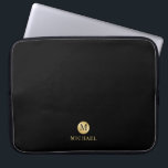 Luxury Black and Gold Personalised Monogram Laptop Sleeve<br><div class="desc">Luxury Black and Gold Personalised Monogram and Name Design
featuring black monogram in gold circle element with name in gold professional font style on black background.

Please Note : The foil details are simulated in the artwork. No actual foil will be used in the making of this product.</div>