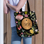 Luxury black and pastel pink floral monogram tote bag<br><div class="desc">Glam girly chic tote bag featuring a chic pastel wildflower meadow pattern and a copper brass gold round label and a little heart over moody black background.          Personalise it with your monogram name initials!</div>