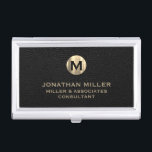Luxury Black Leather Gold Monogram Business Card Holder<br><div class="desc">Elevate your professional look with this stylish and practical business card case. Featuring a brushed monogram medallion with your name company and title in classic block typography, this case is a great way to keep your business cards organised and protected. The black leather print background adds a touch of sophistication,...</div>