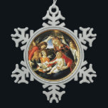 Madonna of the Magnificat Snowflake Pewter Christmas Ornament<br><div class="desc">Madonna del Magnificat is a painting by the Italian Renaissance master Sandro Botticelli, 1487 FLorence Italy .tempera on panel.This work portrays the Virgin Mary crowned by two angels. The Child Jesus is keeping in a hand the pomegranate,  symbol of the Resurrection.</div>