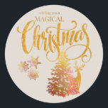 Magical Christmas Gold Tree & Reindeer Champagne Classic Round Sticker<br><div class="desc">wishing you a magical Christmas sticker with gold lettering,  a gold woodland reindeer,  pretty snowflakes and christmas fir tree. The design is on a champagne background,  which you can edit if you wish.</div>