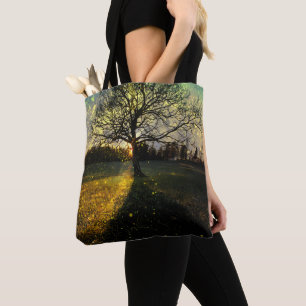 Magical fireflies dreamy landscape tote bag