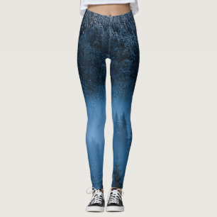 Magical fog over snowy spruce forest leggings