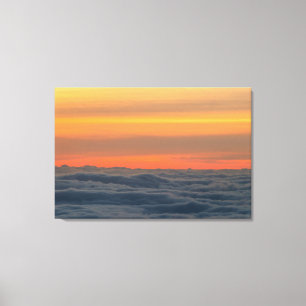 Magical sunset above the clouds canvas print