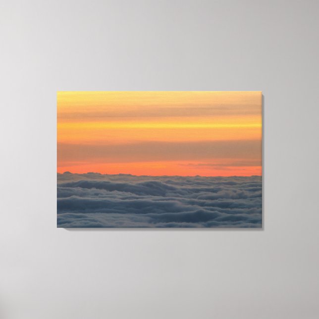 Magical sunset above the clouds canvas print (Front)