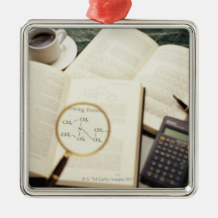 Magnifying glass enlarging molecular diagram metal tree decoration