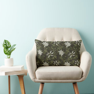 Magnolia and green leaves on black lumbar cushion