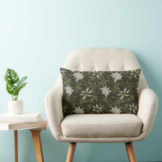Magnolia and green leaves on black lumbar cushion