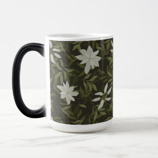 Magnolia and green leaves on black magic mug