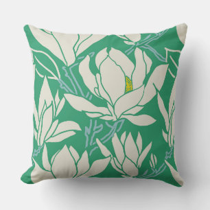 Magnolia graphic in green pattern cushion