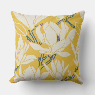 Magnolia graphic in yellow pattern cushion