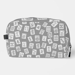 Mahjong tiles symbols on grey dopp kit