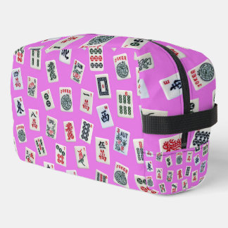 Mahjongg tiles symbols design on pink dopp kit