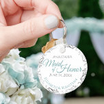 Maid of Honor Wedding Gift Teal & Gray Lacy Key Ring<br><div class="desc">These keychains are designed to give as favors to the Maid of Honor in your wedding party. Designed to coordinate with our Teal & Gray Elegant Wedding Suite, they feature a simple yet elegant design with a white background, teal or turquoise & Gray text, and a silver faux foil floral...</div>