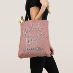 Maid of Honour Pink Glitter Bridal Shower Tote Bag<br><div class="desc">Maid of Honour  Rose Gold Blush Pink Faux Glitter and Sparkle Hand Lettered Brushed Typography Bridal Shower Party Bag. This Maid of Honour bag can be customised with the Maid of Honour's name in a silver and white elegant typography.</div>