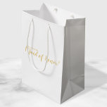 Maid of Honour Proposal Modern Script Gold Medium Gift Bag<br><div class="desc">"Will You Be My Maid of Honour?" Modern Script White and Gold Maid of Honour Proposal Gift Bag featuring title "Will You Be My Maid of Honour?" in gold modern script font style on white background. Please Note: The foil details are simulated in the artwork. No actual foil will be...</div>