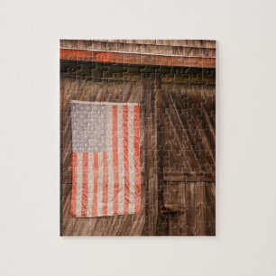 Maine, Faded American flag on door of old barn Jigsaw Puzzle
