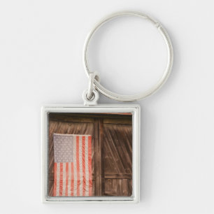 Maine, Faded American flag on door of old barn Key Ring